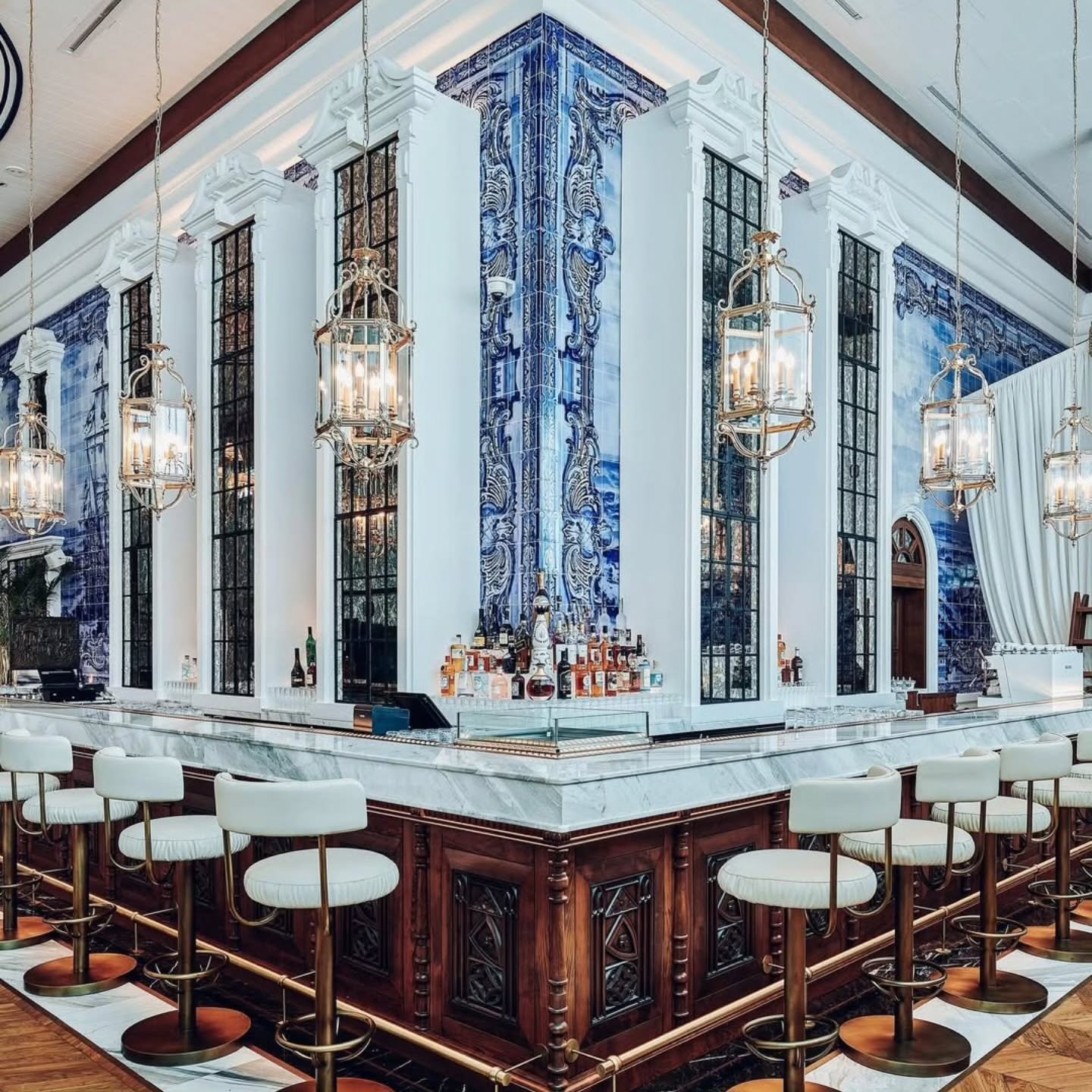 Luxury bar venue with marble counter and blue tile detailing