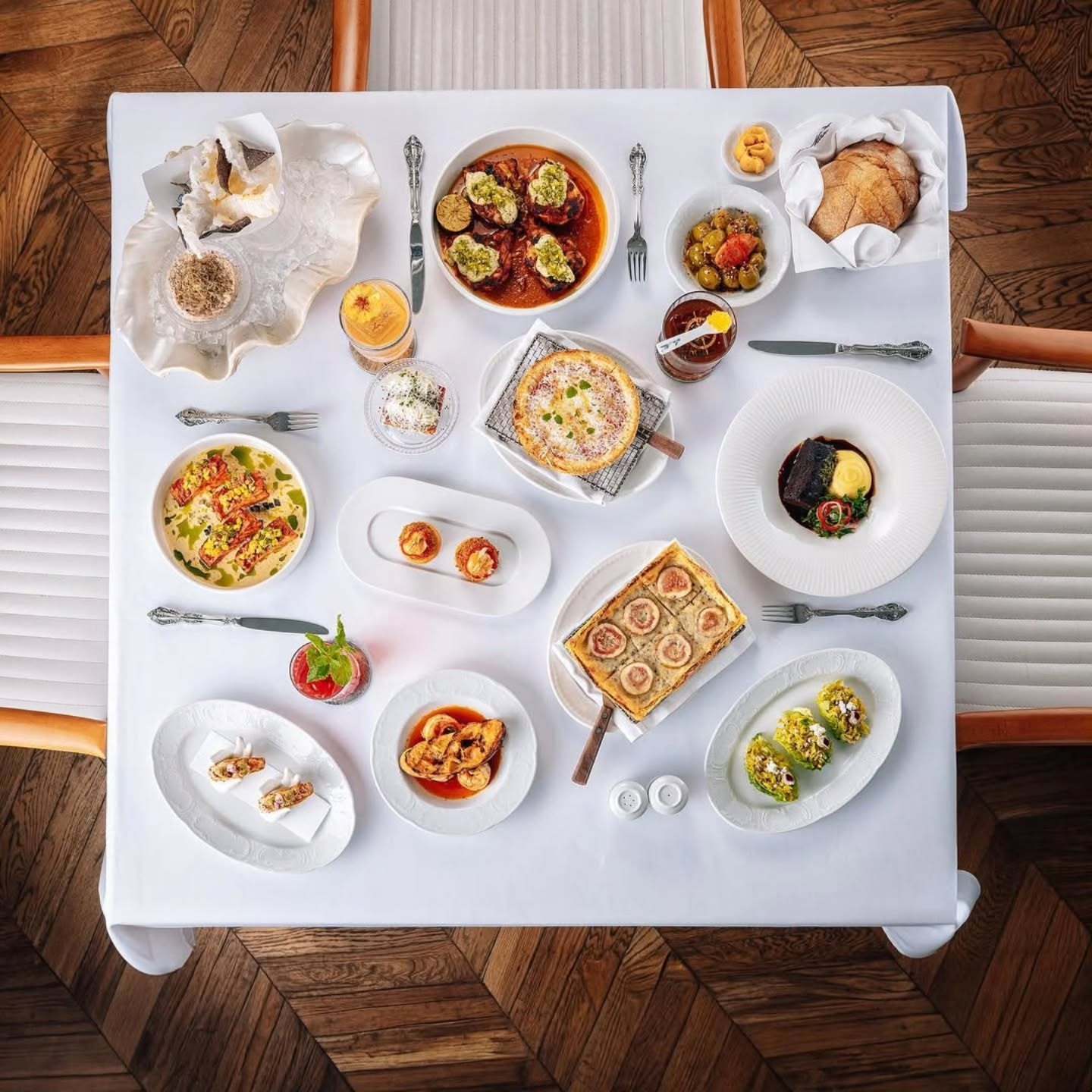 Overhead private dining spread arranged for a luxury table